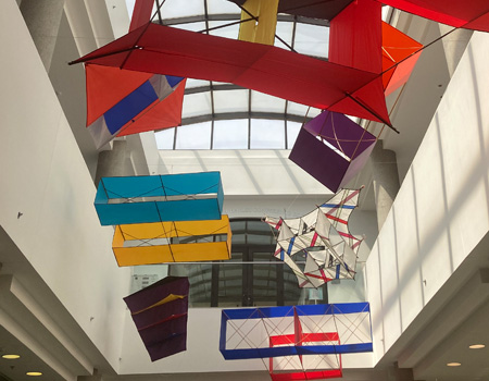 Kites Exhibition in Headquarters Atrium by various kite makers including Chuck Holmes, H. B. Alexander